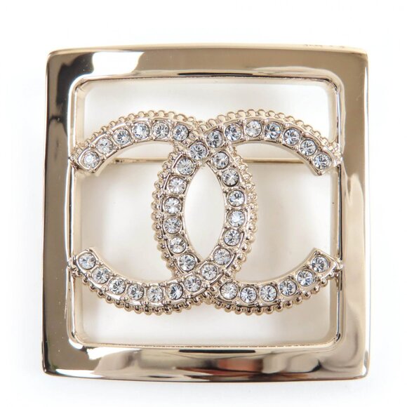 CHANEL Gold Logo Brooch
